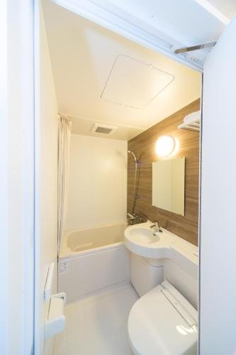 Фото Shinsaibashi Higashi Crystal Hotel