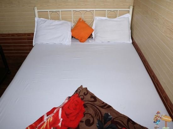 Фото Travellers Inn Mumbai