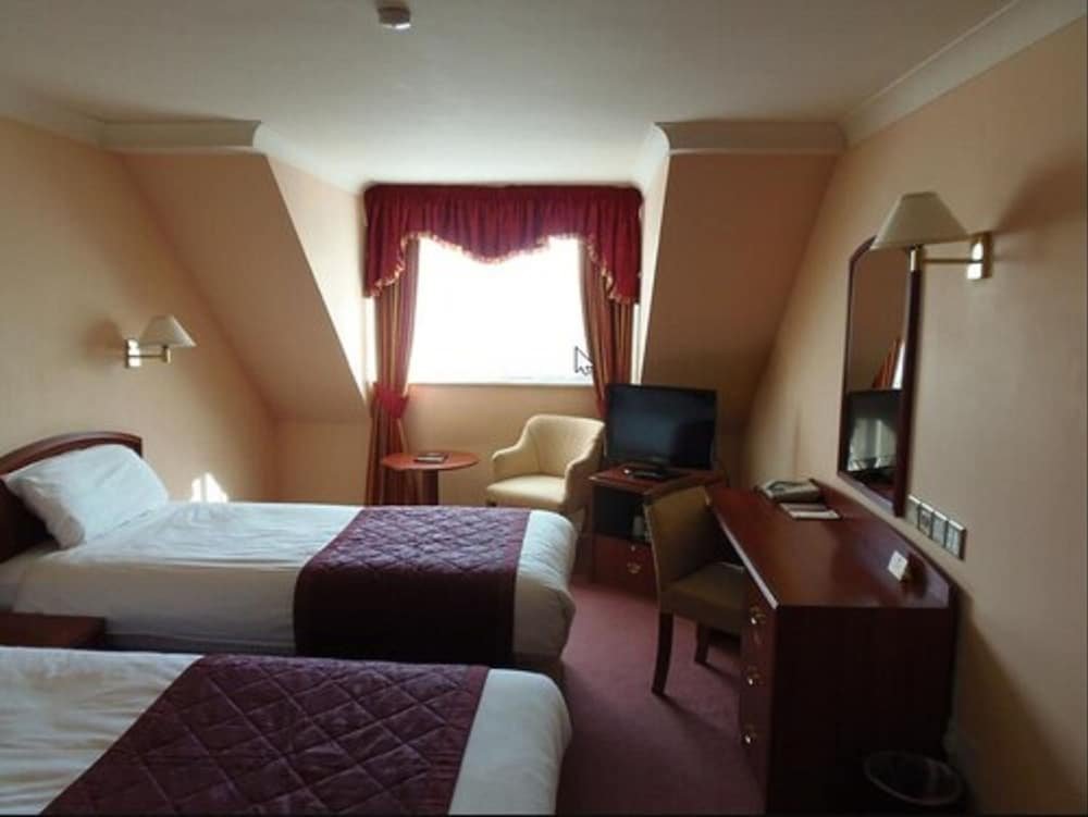 Фото Potters International Hotel