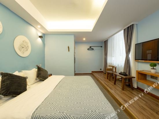 Фото Spring Blossoms Inn Yangshuo West Street