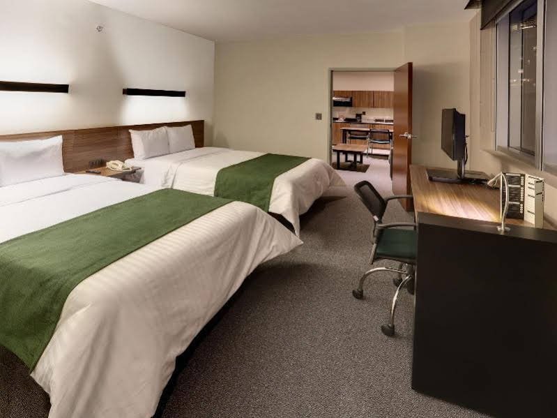 Фото City Express Suites by Marriott Cabo San Lucas