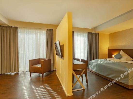 Фото Trip Inn Conference Hotel & Suites