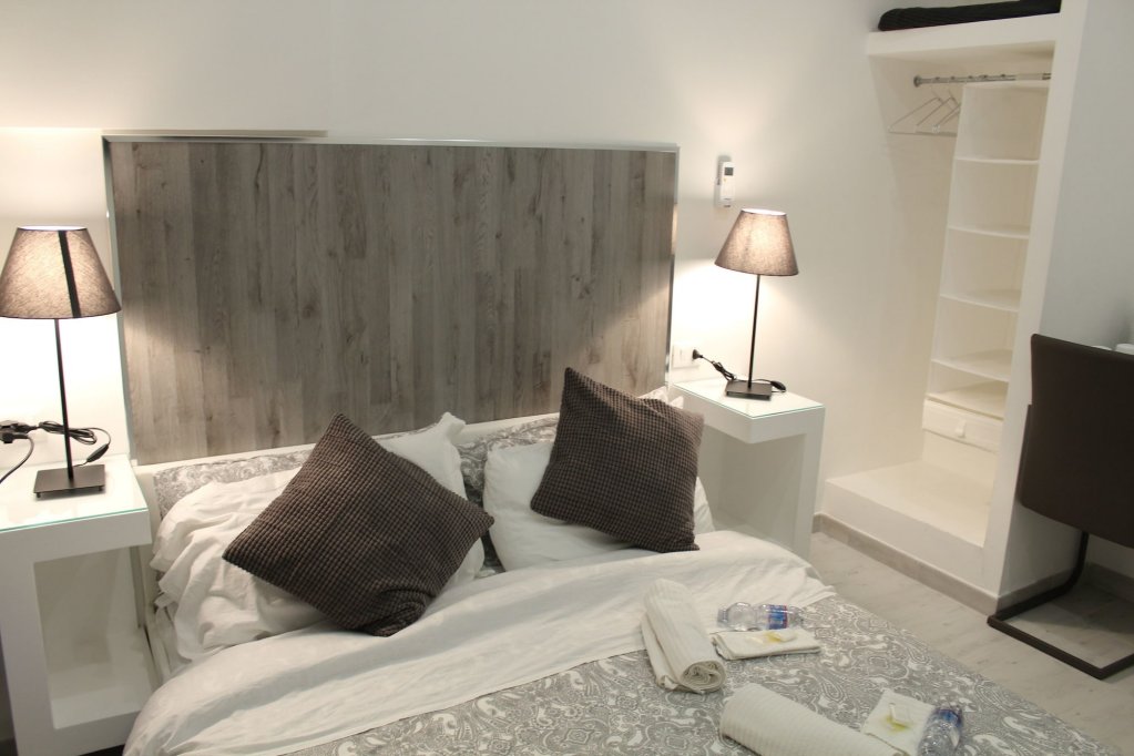 Фото Empire Suites