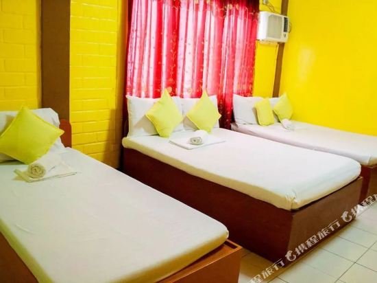 Фото Oyo 749 La Maria Pension And Tourist Inn Hotel