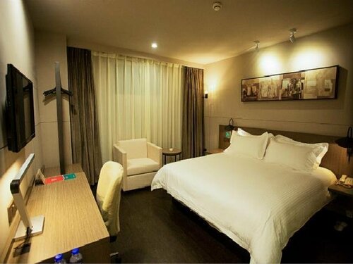 Гостевой дом Zhenjiang Island Apartment Railway Station South Square Wanda Branch в Чжэньцзяне
