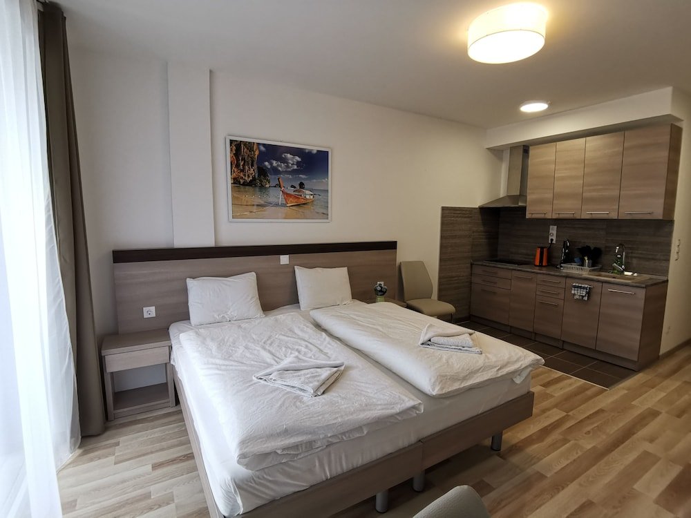 Фото Corvin Holiday Apartment Hotel