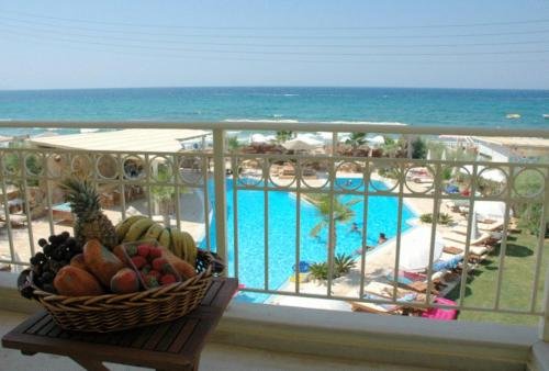 Фото Parthenis Beach Suites by the Sea