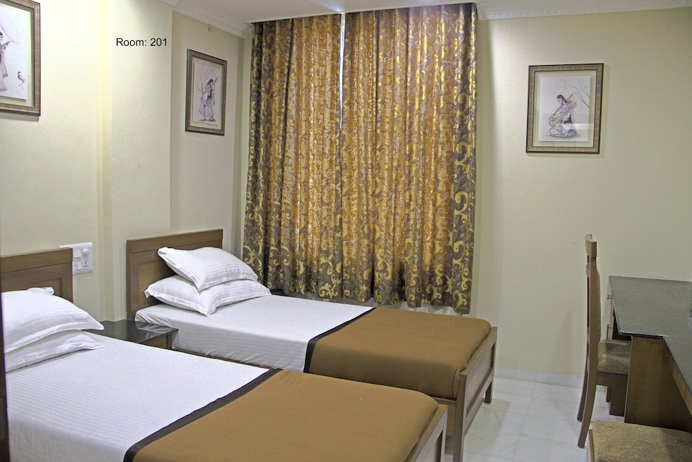 Фото Click White House Residency Vadodara