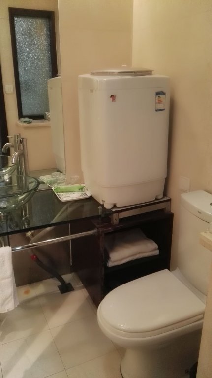 Фото Shanghai Jiarong Hotel Apartment