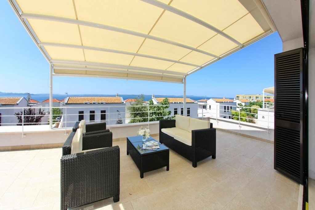 Фото Sunnyside Apartments Petrčane