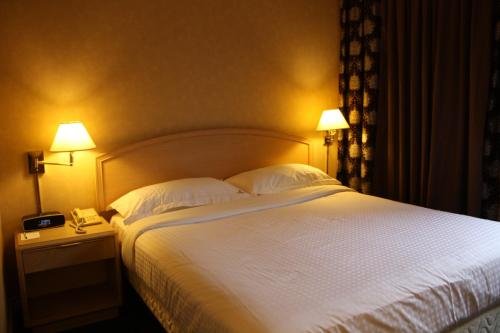 Фото Garden Suite Hotel