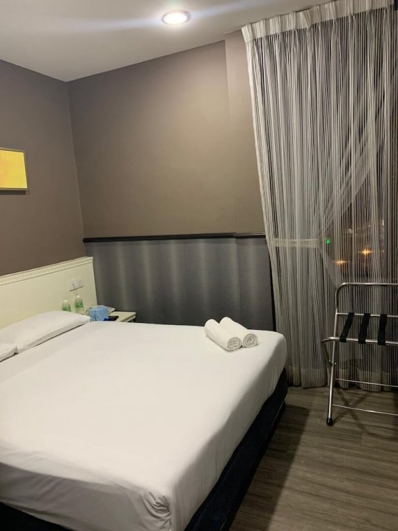 Фото Wang's Hotel Gurney Drive