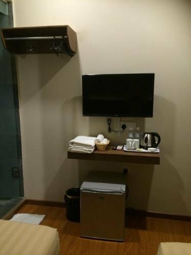 Гостиница Super Oyo 977 Hong Kong Suites