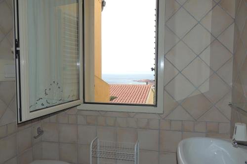 Фото Affittimoderni Isola Rossa Élite