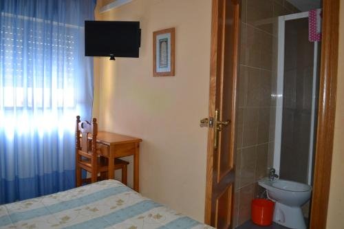 Фото Hostal Al-Qazeres