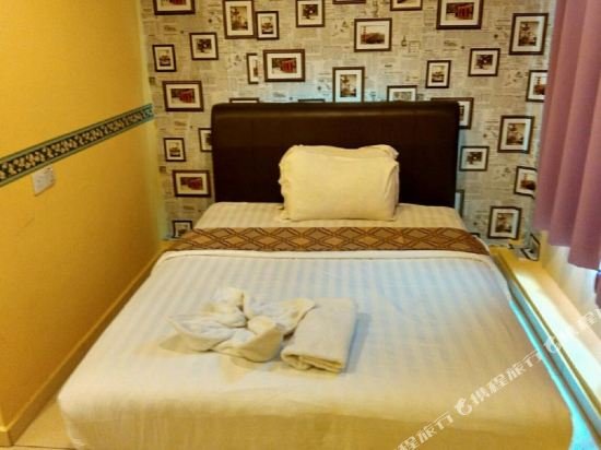 Фото Hotel Zamburger Sungai Besi