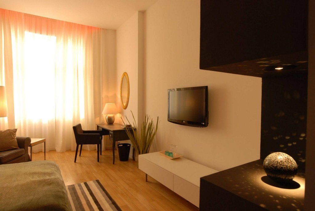 Фото Qiu Hotel Rooms