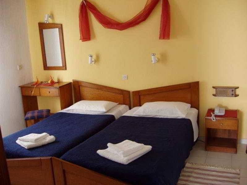 Фото Xenios Dolphin Beach Hotel