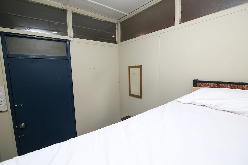 Фото Spot On 89929 Tropical Lodge