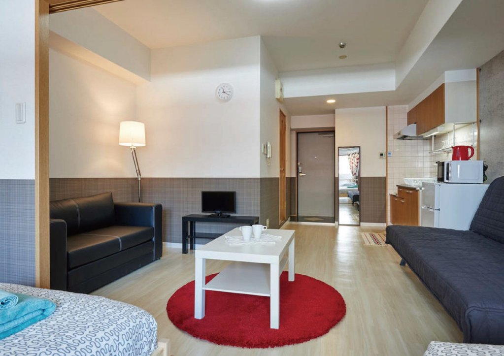 Фото Grande Famille Shimanouchi Dotonbori Condo