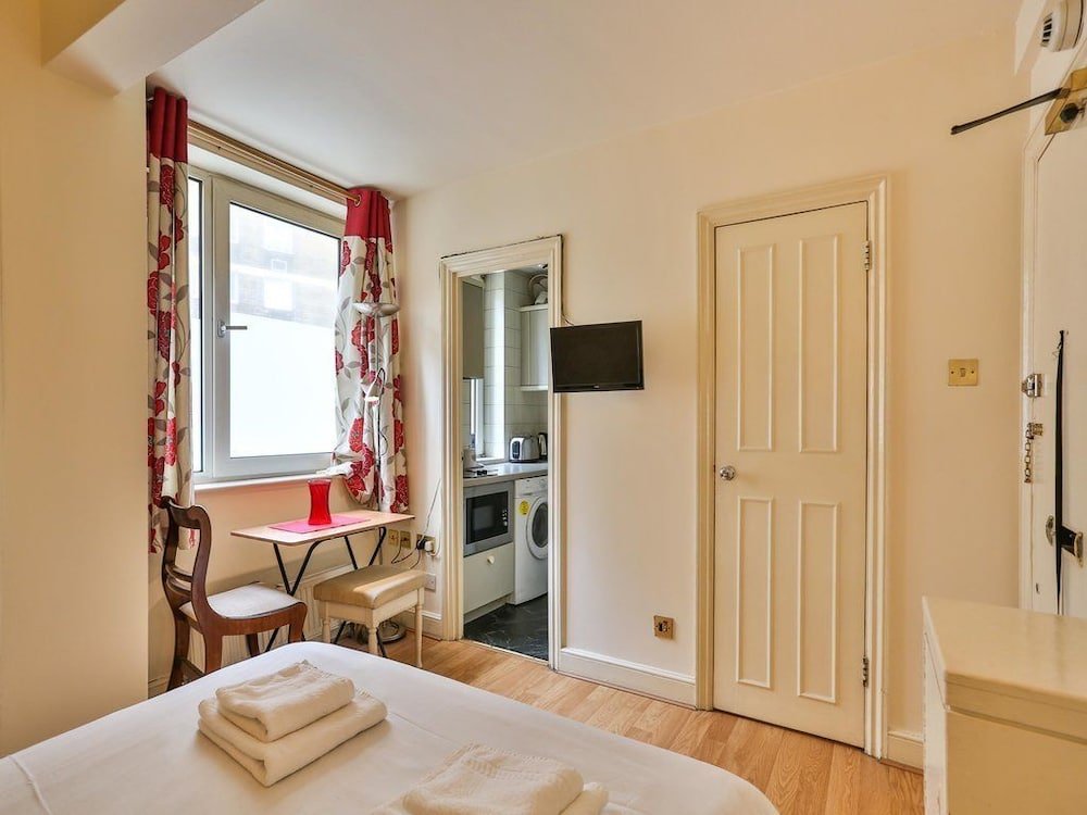 Фото The Apartments by The Sloane Club