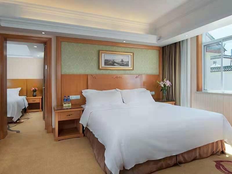 Гостиница Vienna Hotel Lijiang Yuxue Avenue Branch