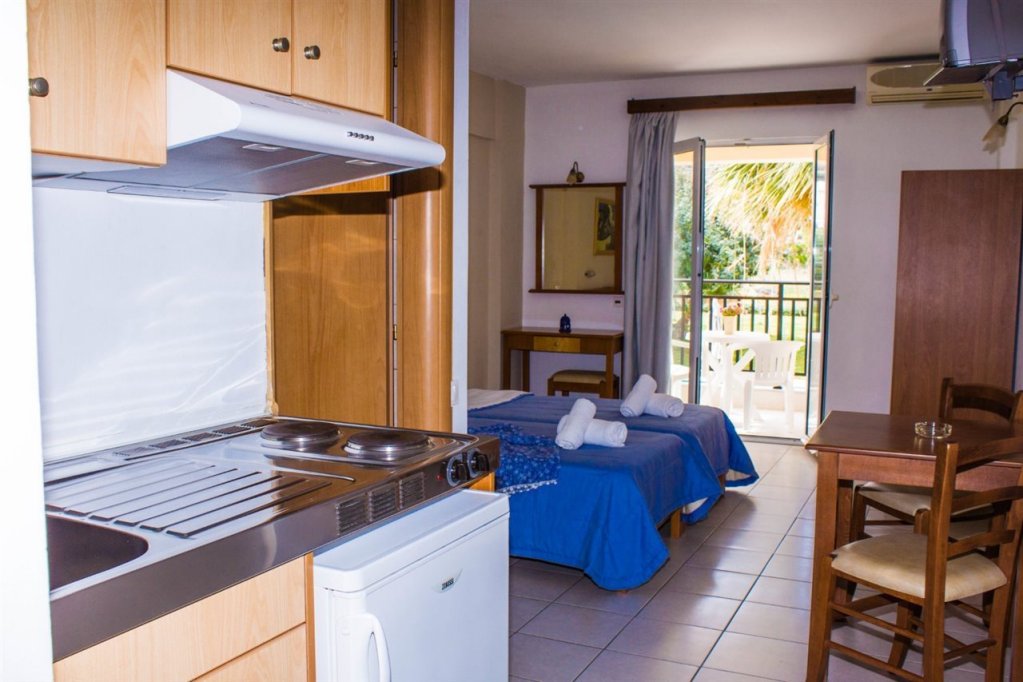 Фото Sunshine Studios & Apartments