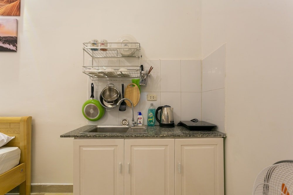 Фото Halo Serviced Apartment