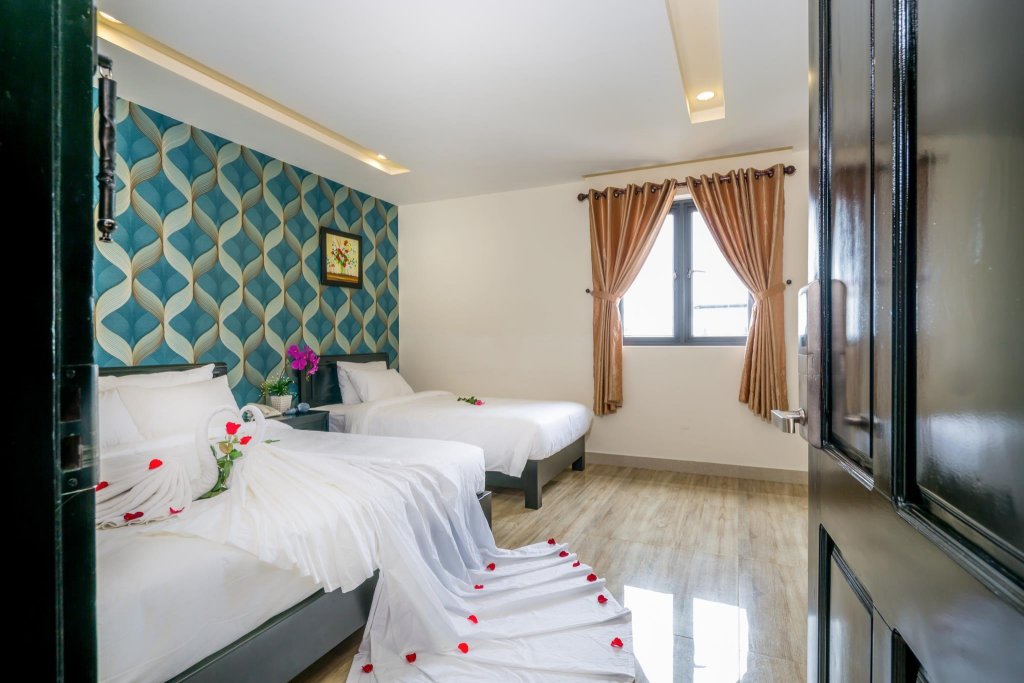 Фото La Maison Da Nang Beach