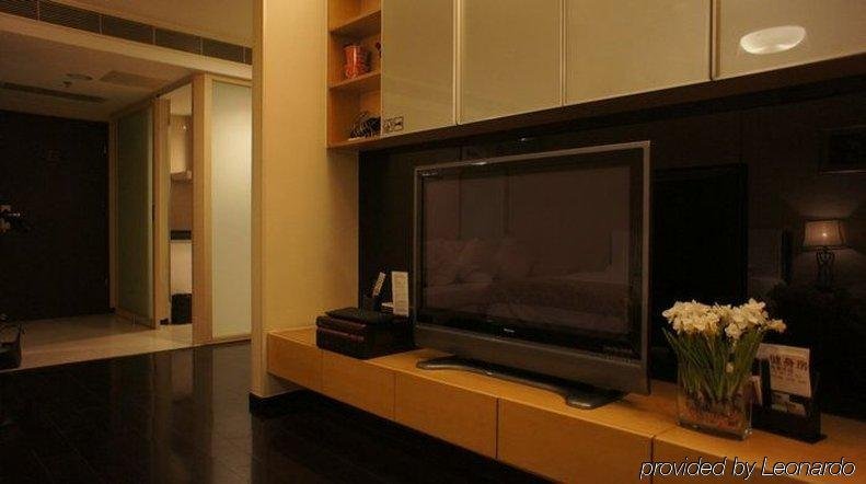 Фото Qingdao Housing International Hotel