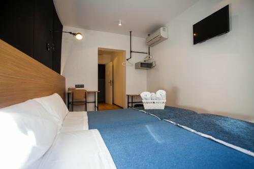 Гостиница Hostal Cc Malasaña в Мадриде