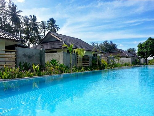 Гостиница Coconut Beach Villa Langkawi в Штате Кедах