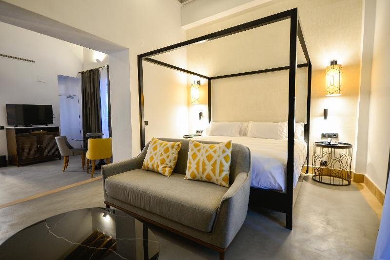 Фото Legado Alcázar Hotel