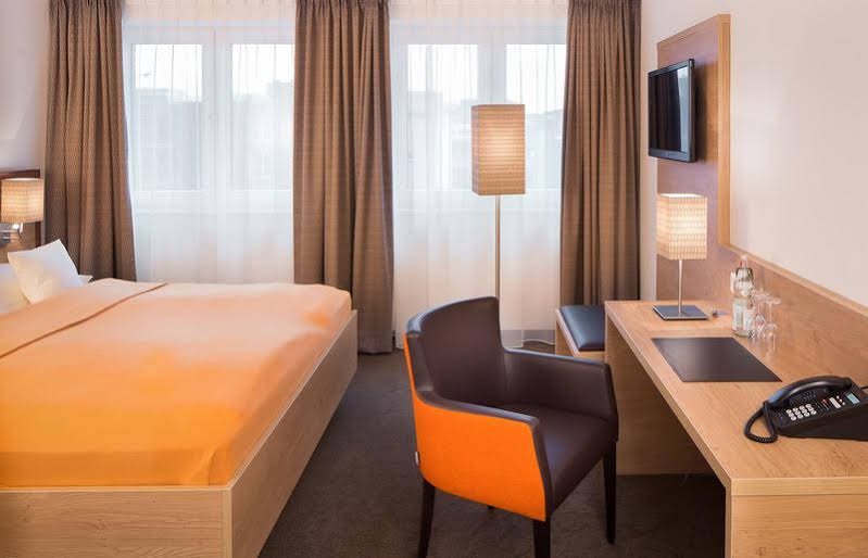 Фото Stadthotel am Römerturm