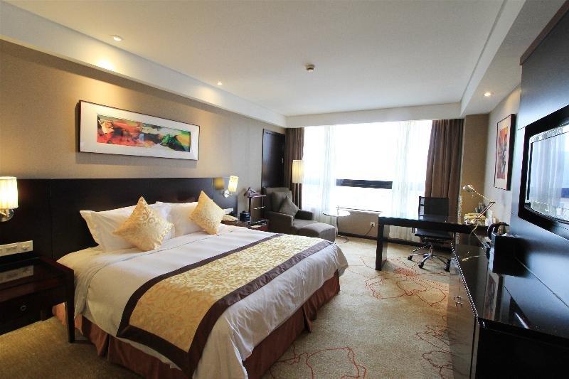 Фото Shanghai Greenland Jiulong Hotel