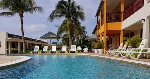 Фото Aruba Quality Apartments & Suites