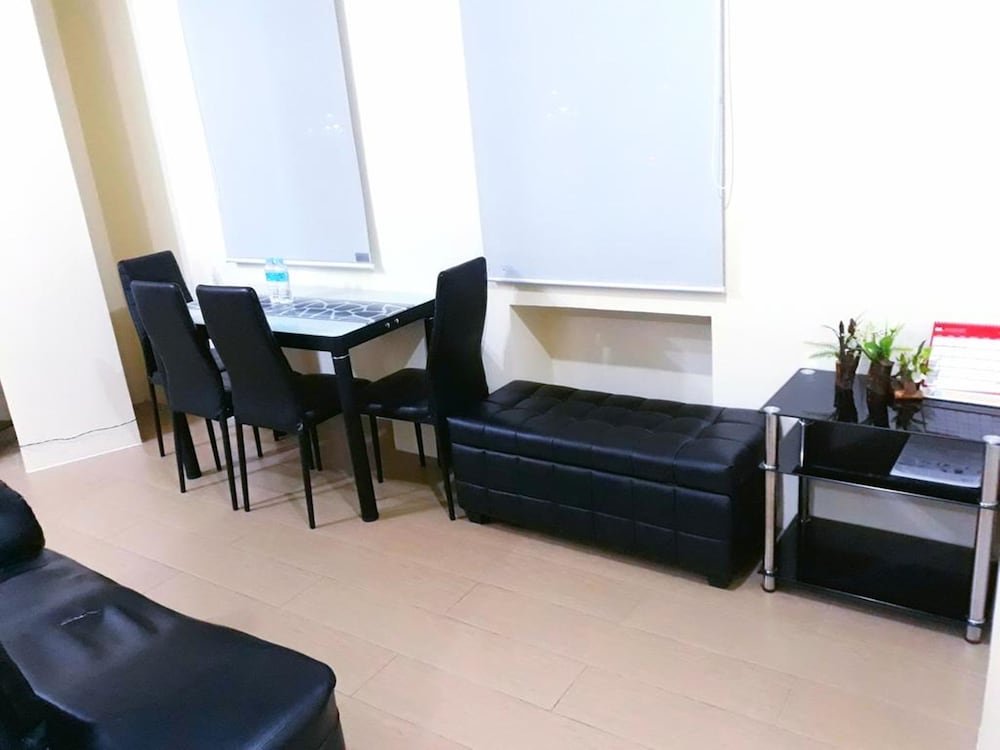 Фото Tess and Tessha Condotel near T3 Airport