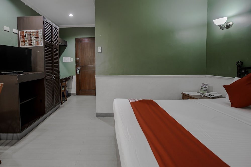 Фото Capital O 740 Bliss Hotel Dau