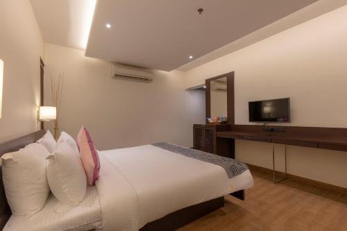 Фото Regenta Rpj Rajkot by Royal Orchid Hotels