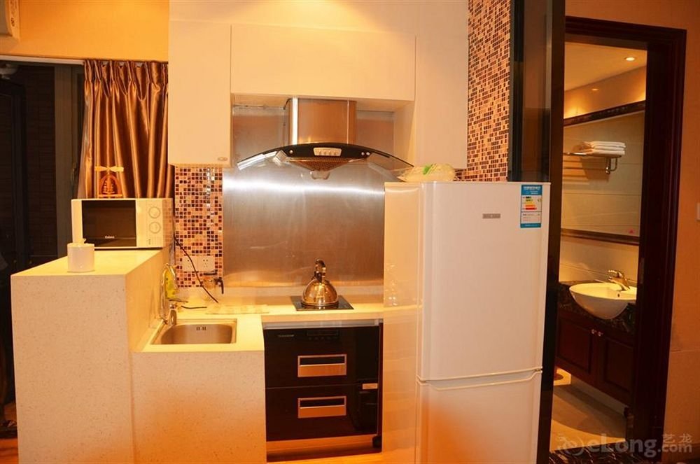 Фото Guangzhou Damei Apartment