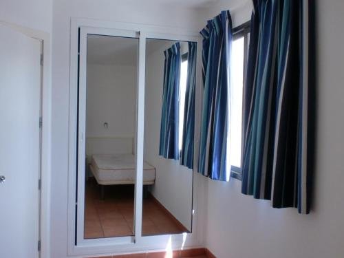 Фото Apartamentos Puerto Bello