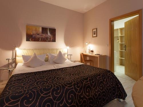 Фото Hotel Am Grudenberg