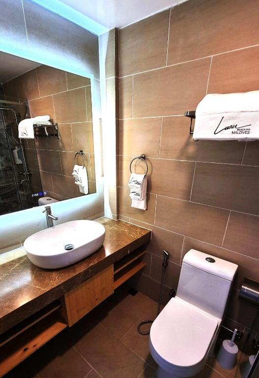 Фото Luau Beach Inn