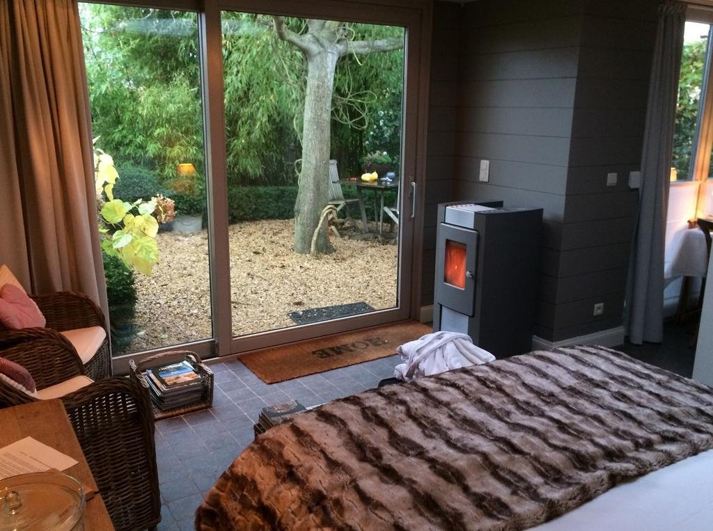 Фото B&b De Tuinkamer