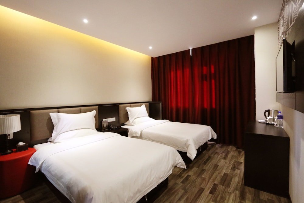 Фото Xinhua Boutique Hotel