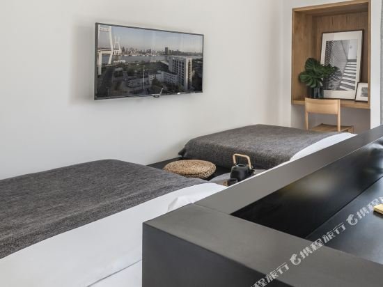 Фото BaseLIVING Wending Serviced Apartment