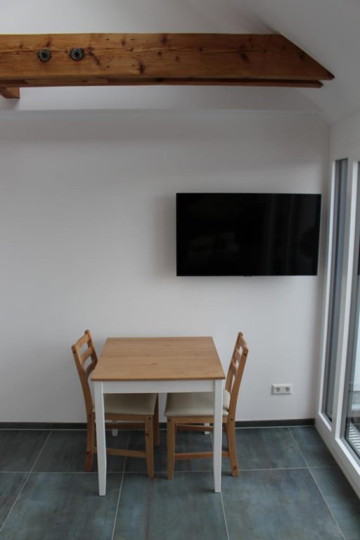 Фото Apartments zum Roten Lamm