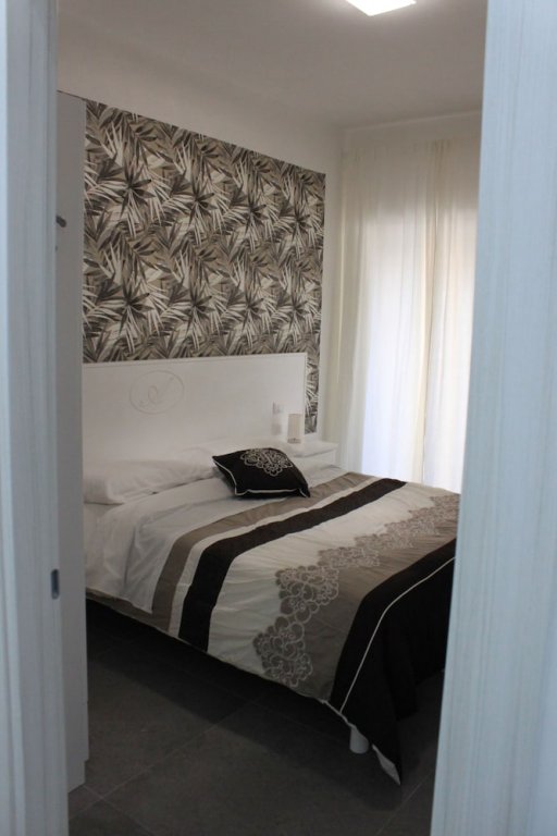 Фото Alambrado Rooms & Suites