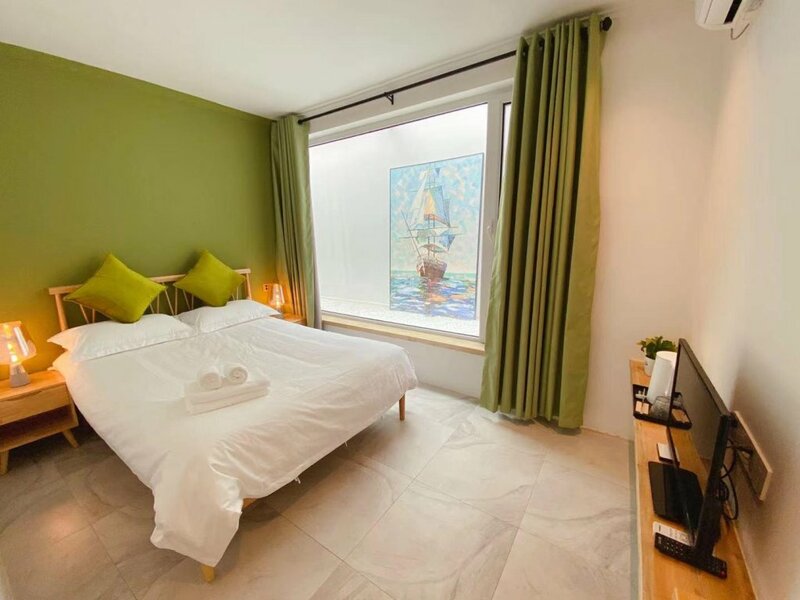 Гостиница Lantian Garden Hostel в Циндао