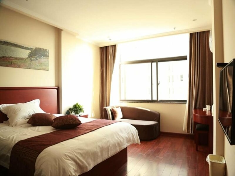 Гостиница GreenTree Inn Suzhou Si County Taoyuan Rd Hongcheng Garden Hotel в Сучжоу